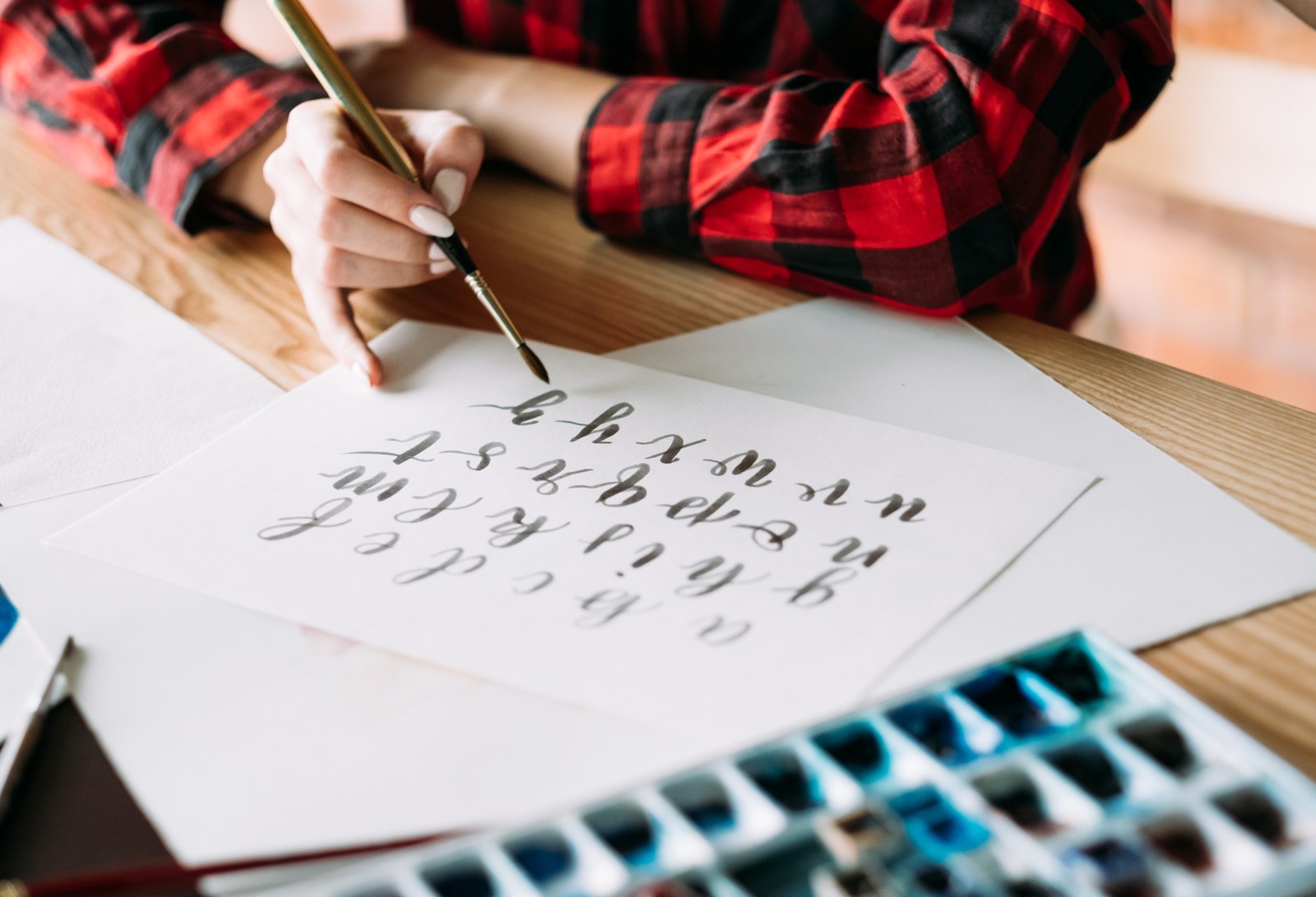 Painting a brush script alphabet with watercolors